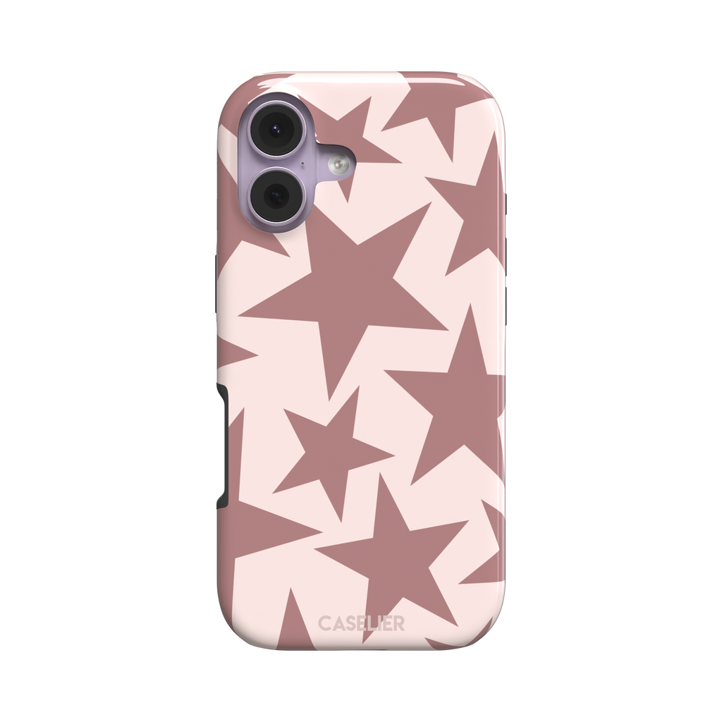 Stars phone case variant in dusty rose and blush pink with oversized scattered star pattern, phone case by Caselier — tough case, front view