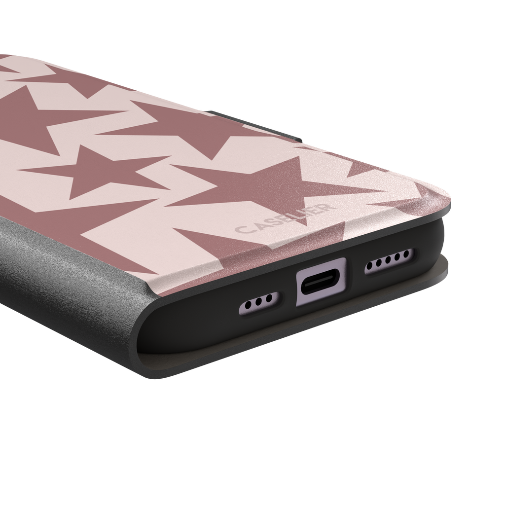 Stars phone case variant in dusty rose and blush pink with oversized scattered star pattern, phone case by Caselier — wallet case, charging port detail