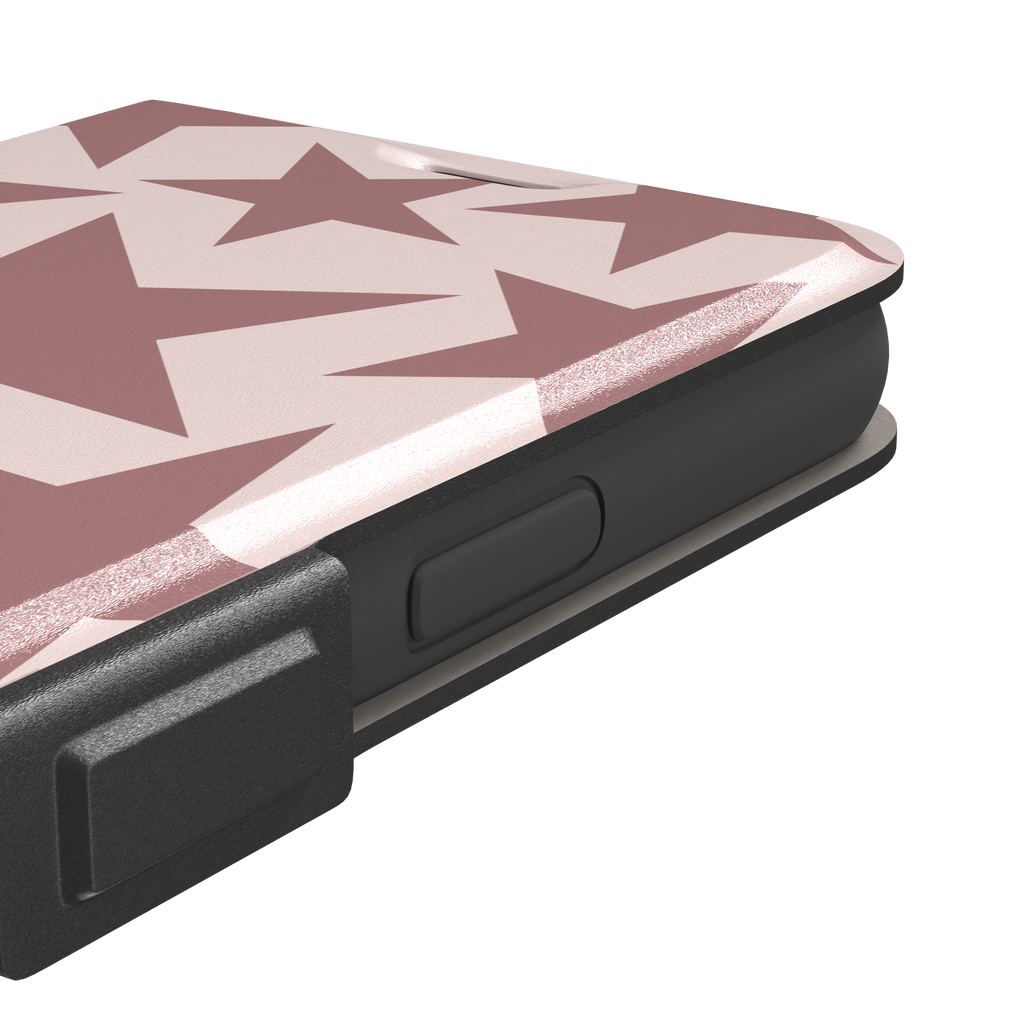 Stars phone case variant in dusty rose and blush pink with oversized scattered star pattern, phone case by Caselier — wallet case, volume buttons detail