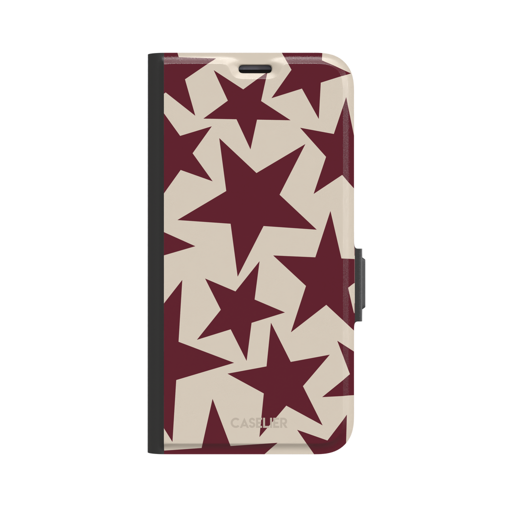 Stars phone case in deep crimson and warm cream with oversized scattered star pattern, phone case by Caselier — wallet case, front view
