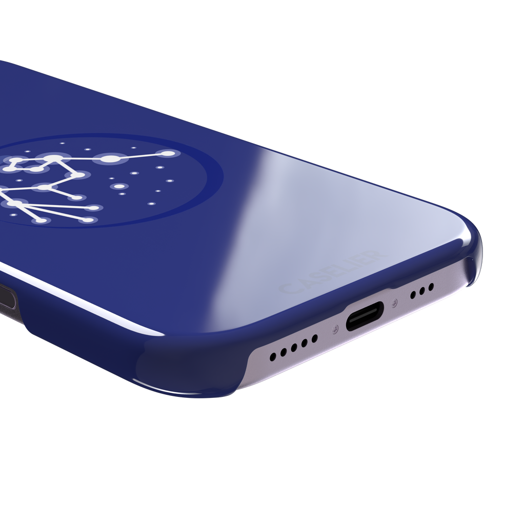 Starsigns phone case showing the Scorpio constellation as a glowing white star map inside a blue orb on a cobalt blue case, phone case by Caselier — snap case, charging port detail