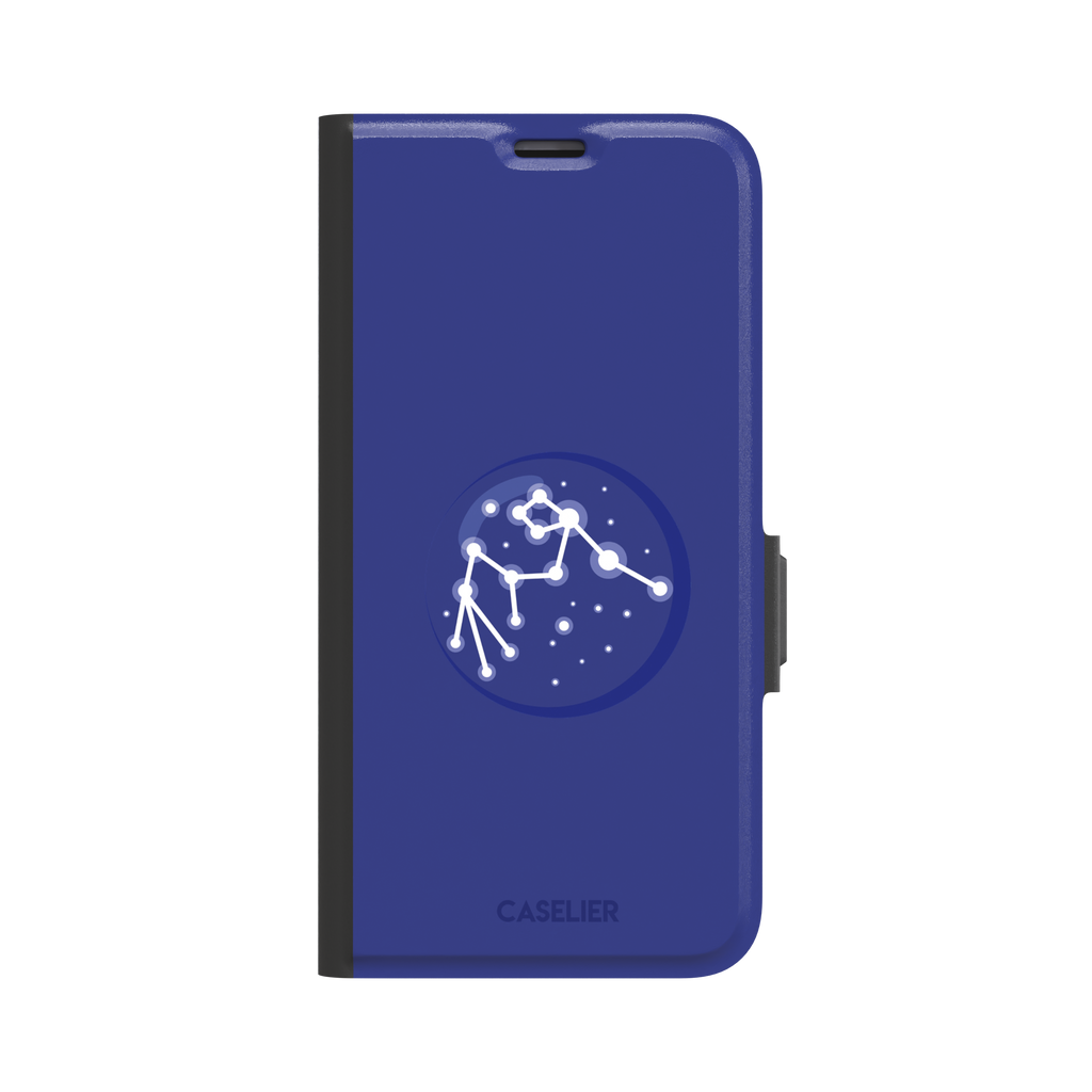 Starsigns phone case showing the Scorpio constellation as a glowing white star map inside a blue orb on a cobalt blue case, phone case by Caselier — wallet case, front view