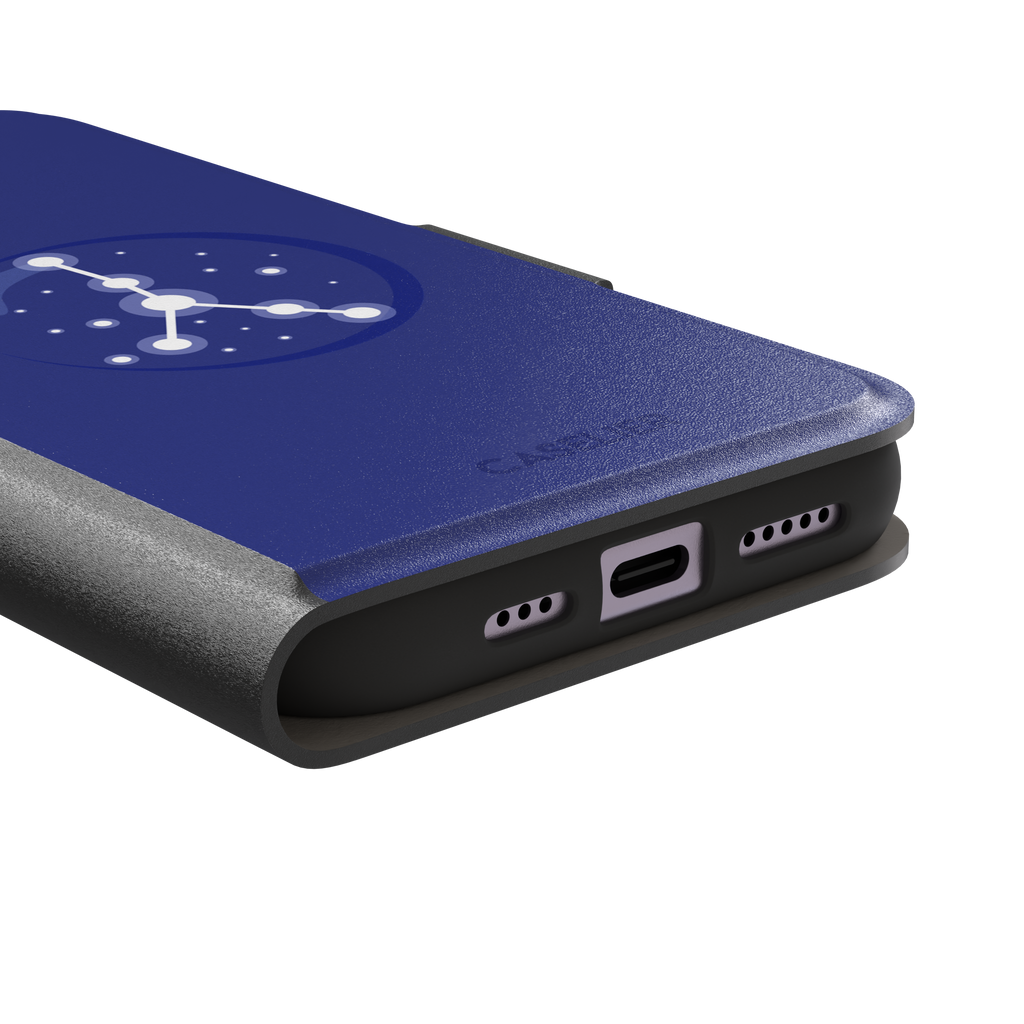 Starsigns phone case showing the Cancer constellation as a glowing white branching star map inside a blue orb on a cobalt blue case, phone case by Caselier — wallet case, charging port detail