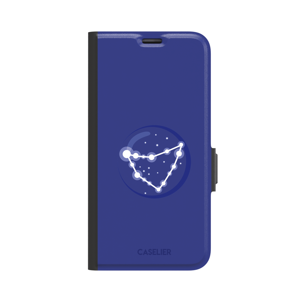 Starsigns phone case showing the Capricorn constellation as a glowing white angular star map inside a blue orb on a cobalt blue case, phone case by Caselier — wallet case, front view