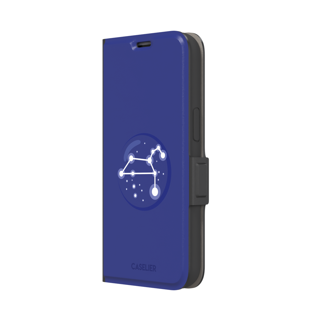 Starsigns phone case showing the Leo constellation as a glowing white quadrilateral star map inside a blue orb on a cobalt blue case, phone case by Caselier — wallet case, right view