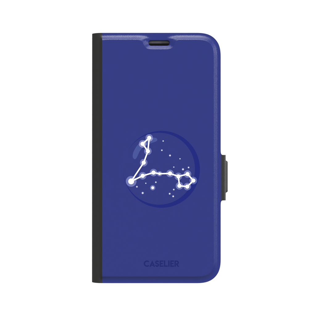 Starsigns phone case showing the Pisces constellation as a glowing white elongated star map inside a blue orb on a cobalt blue case, phone case by Caselier — wallet case, front view