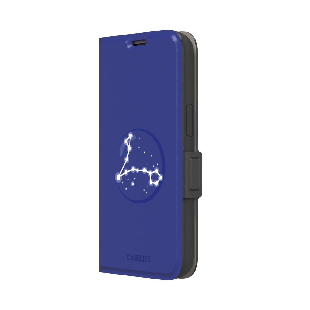 Starsigns phone case showing the Pisces constellation as a glowing white elongated star map inside a blue orb on a cobalt blue case, phone case by Caselier — wallet case, right view