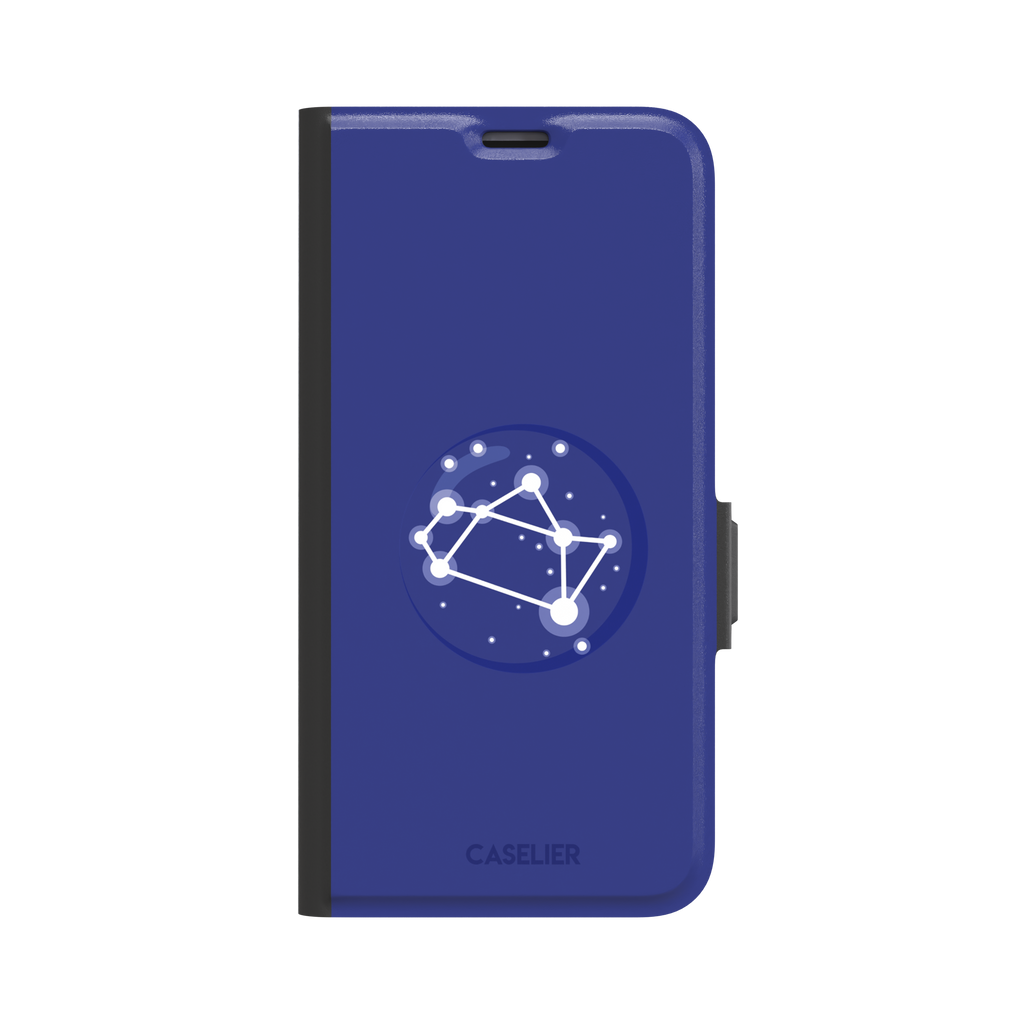 Starsigns phone case showing the Sagittarius constellation as a glowing white rectangular star map inside a blue orb on a cobalt blue case, phone case by Caselier — wallet case, front view
