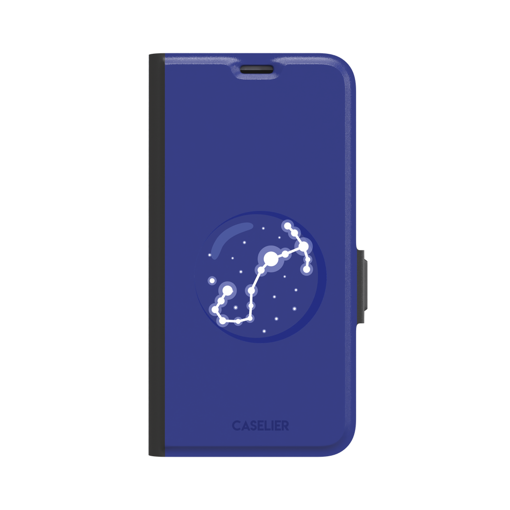 Starsigns phone case showing the Taurus constellation as a glowing white diagonal star map inside a blue orb on a cobalt blue case, phone case by Caselier — wallet case, front view