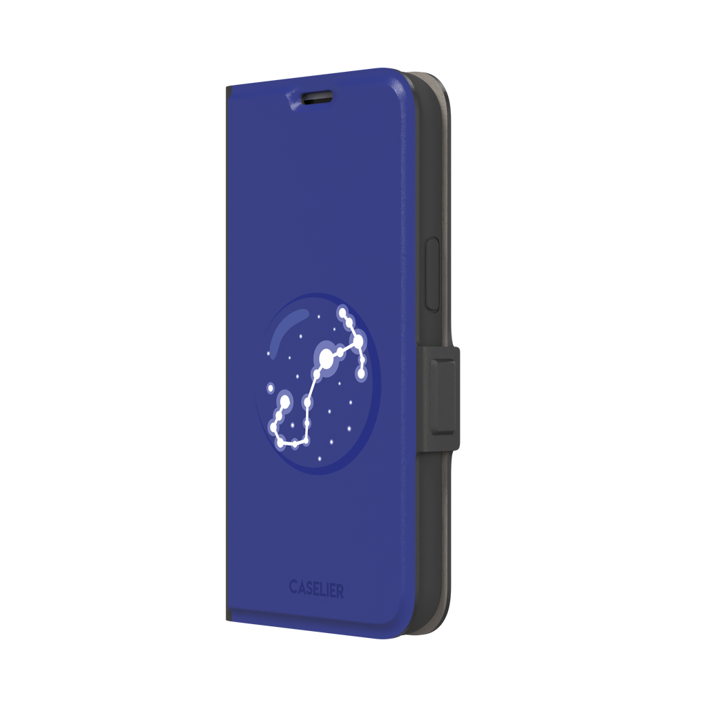 Starsigns phone case showing the Taurus constellation as a glowing white diagonal star map inside a blue orb on a cobalt blue case, phone case by Caselier — wallet case, right view