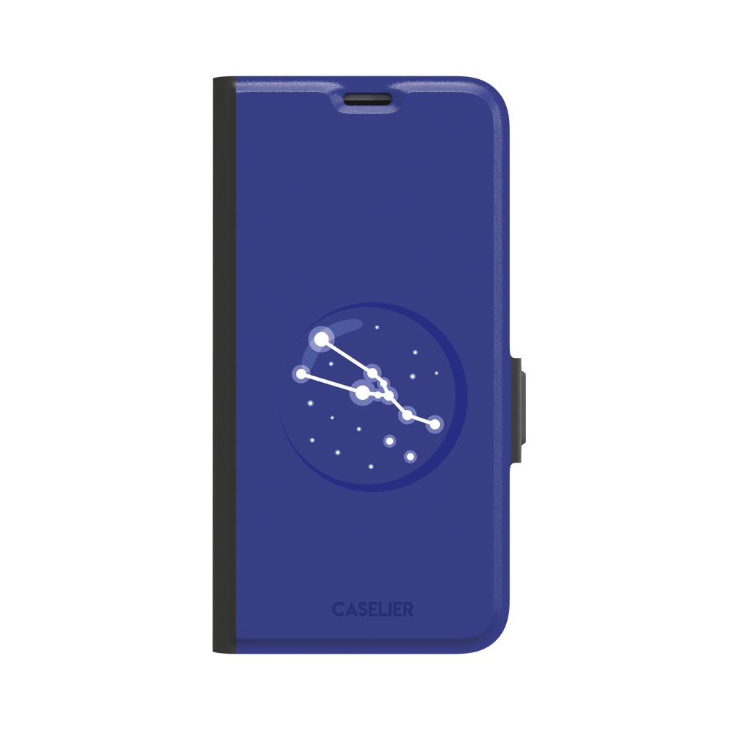 Starsigns phone case showing the Virgo constellation as a glowing white curved star map inside a blue orb on a cobalt blue case, phone case by Caselier — wallet case, front view