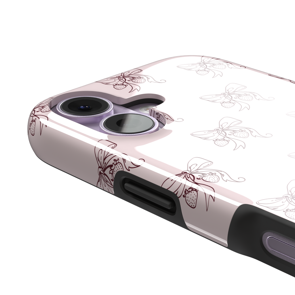 Strawberry Bows phone case in blush pink with an all-over pattern of line-drawn ribbon bows and hanging strawberries, phone case by Caselier — tough case, volume buttons detail