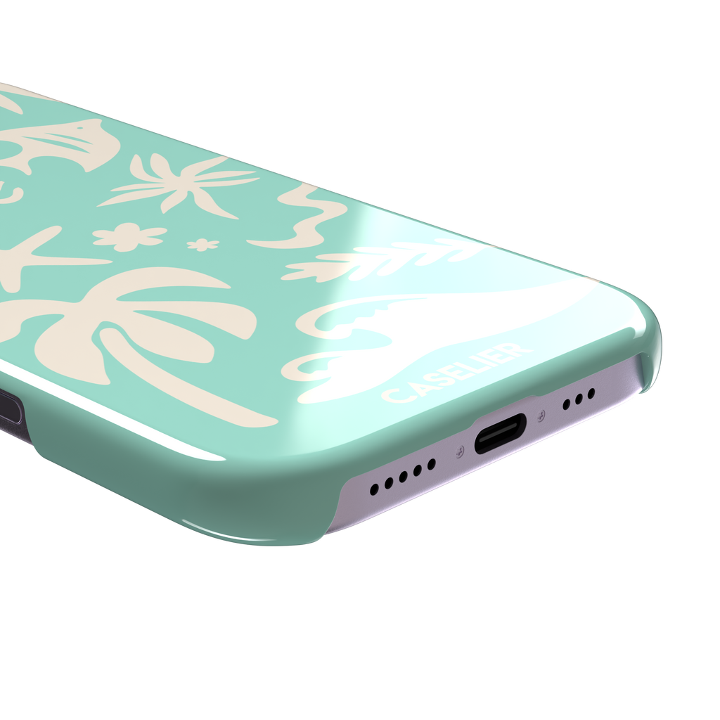 Summer Time phone case in mint green with cream tropical cutout silhouettes including palm trees, starfish, waves and a fish, phone case by Caselier — snap case, charging port detail