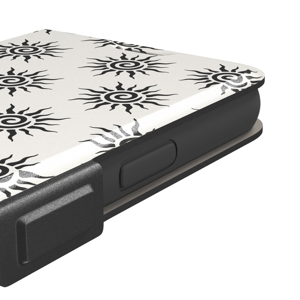 Sunkissed phone case in black and white with repeating tribal spiral sun pattern on a crisp white background, phone case by Caselier — wallet case, volume buttons detail