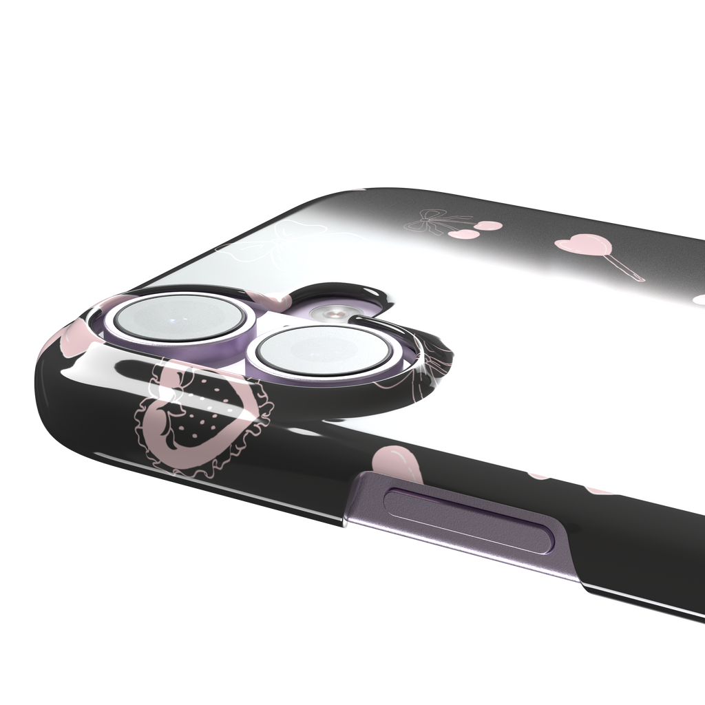Sweetness Overload phone case in dark charcoal grey with pink bows, cherries, heart lollipops and frilled strawberry heart illustrations — snap case, volume buttons detail