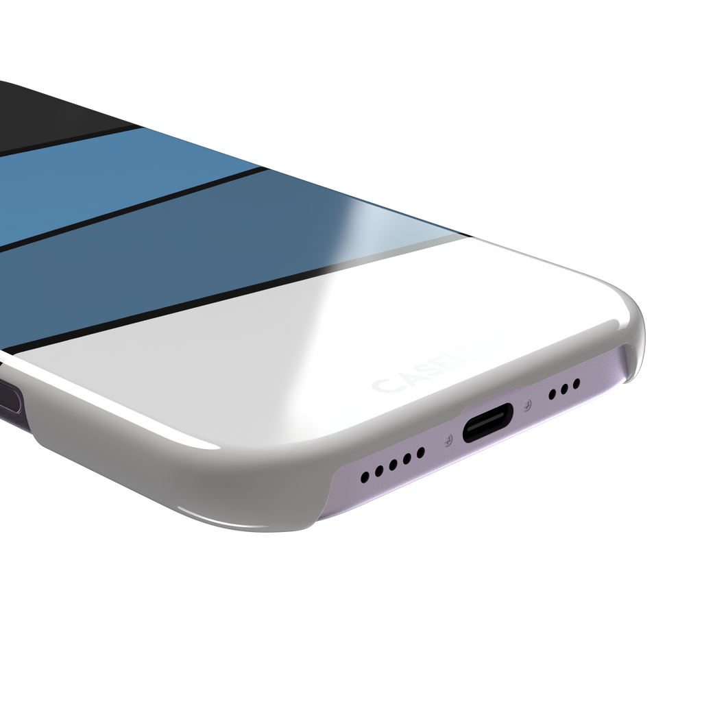 Tectonic Plates phone case variant in black, steel blue, muted blue and white diagonal color blocks with black dividing lines, phone case by Caselier — snap case, charging port detail