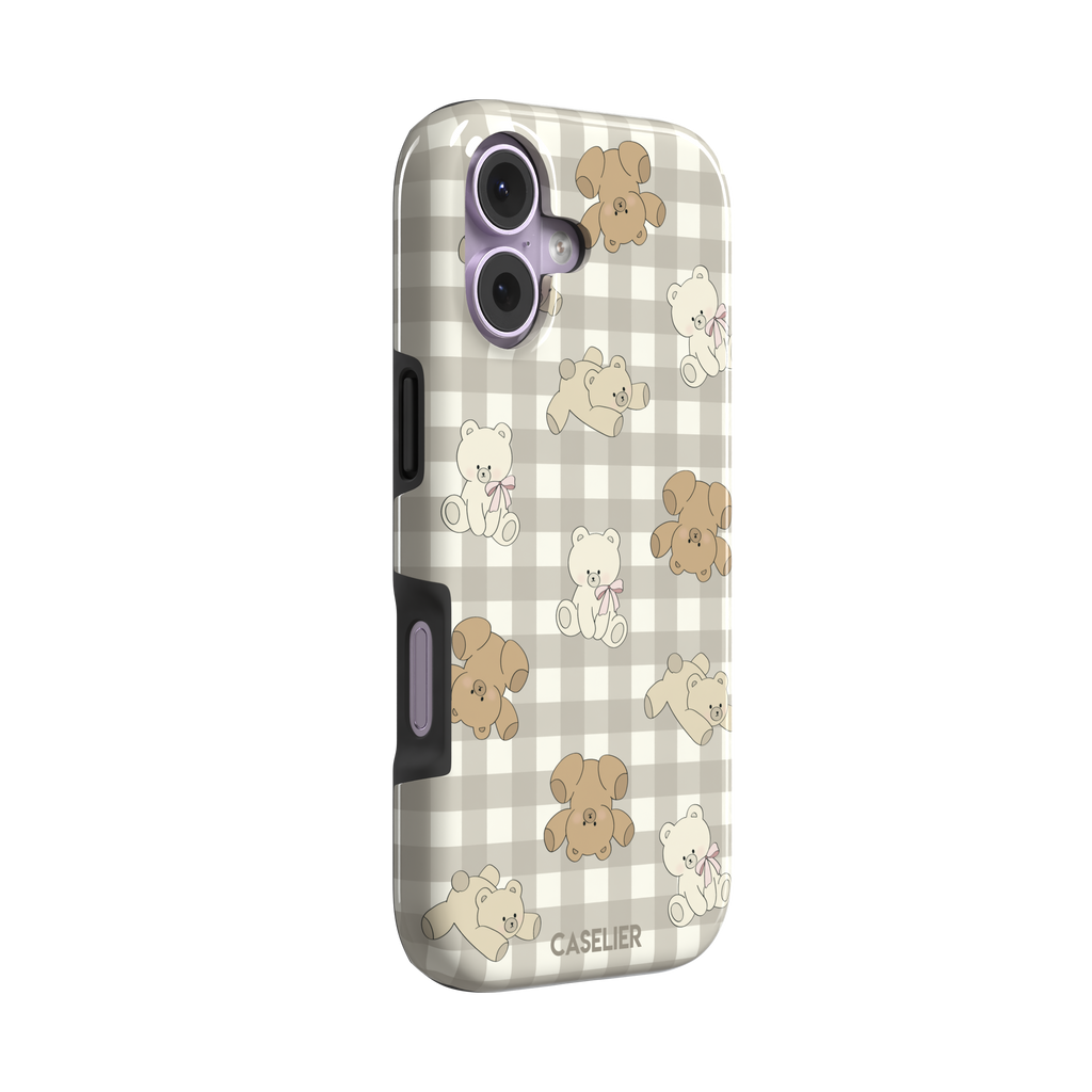 Teddybears phone case in a grey-toned gingham variant with beige and ivory illustrated teddy bears and pink bow details — tough case, left view