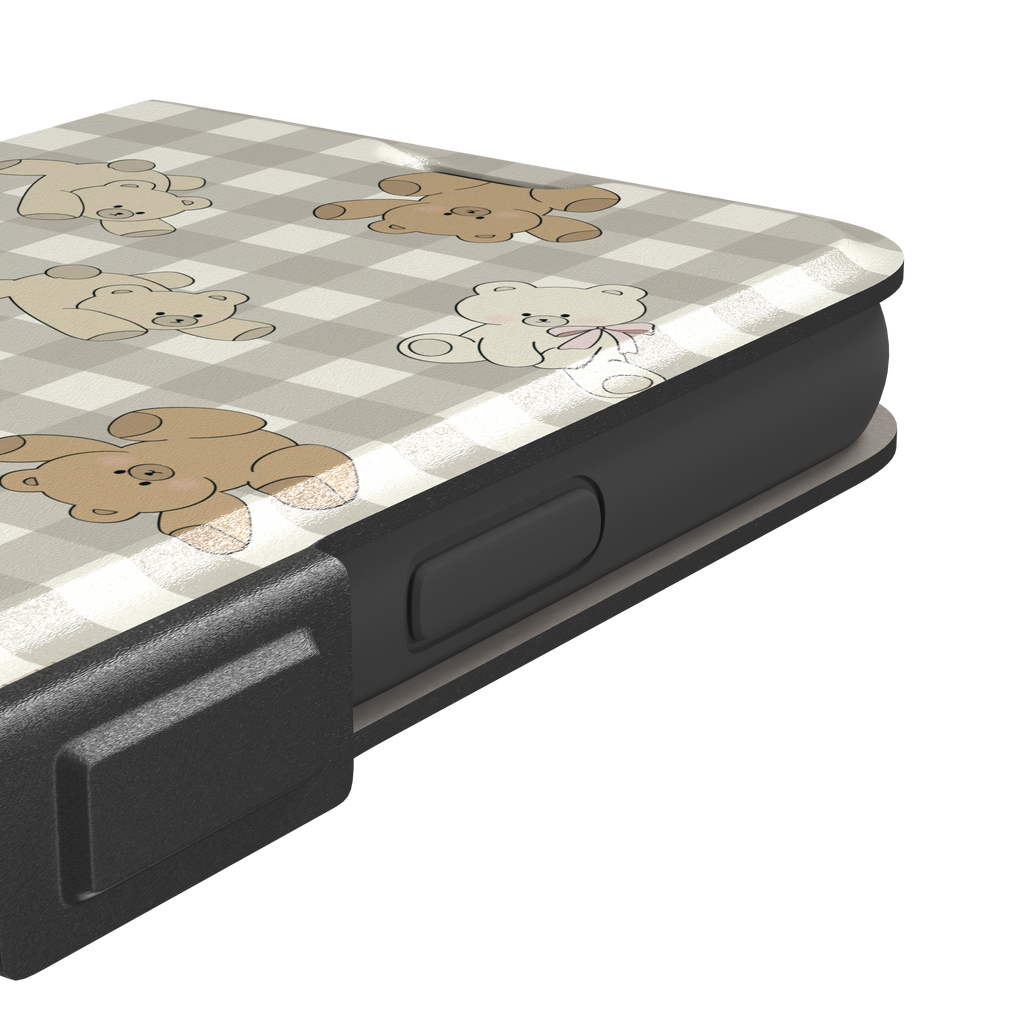 Teddybears phone case in a grey-toned gingham variant with beige and ivory illustrated teddy bears and pink bow details — wallet case, volume buttons detail