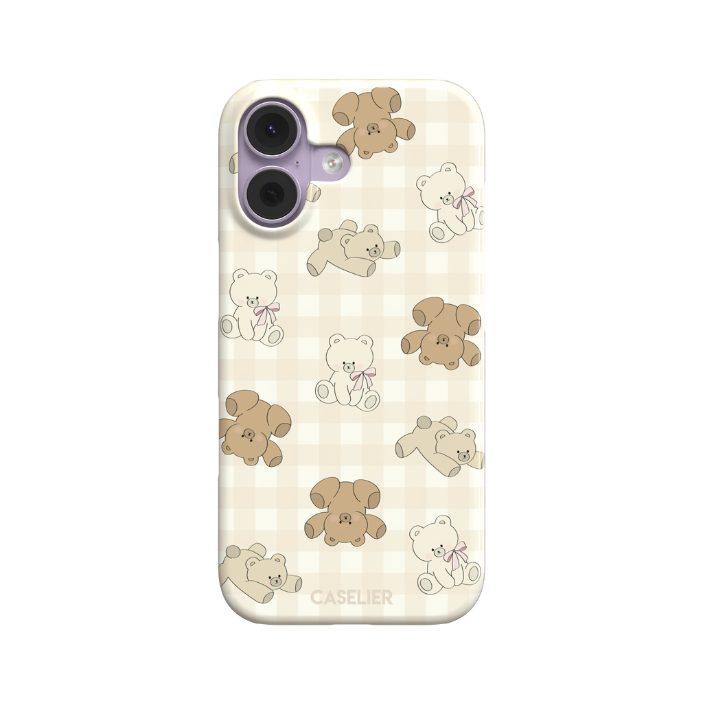 Teddybears phone case in warm cream with illustrated beige and ivory teddy bears scattered over a gingham grid pattern, some bears wearing soft pink bows — snap case, front view