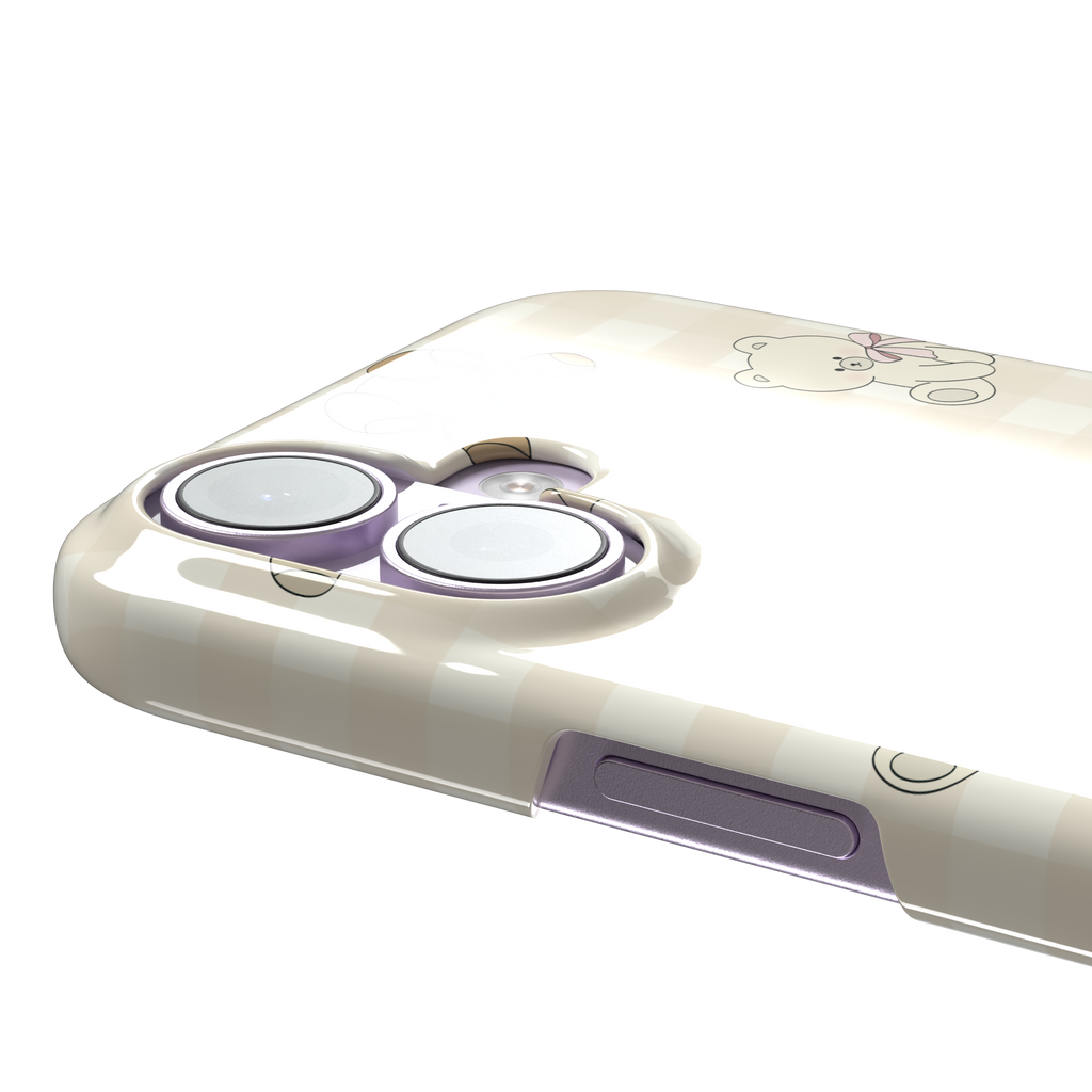 Teddybears phone case in warm cream with illustrated beige and ivory teddy bears scattered over a gingham grid pattern, some bears wearing soft pink bows — snap case, volume buttons detail