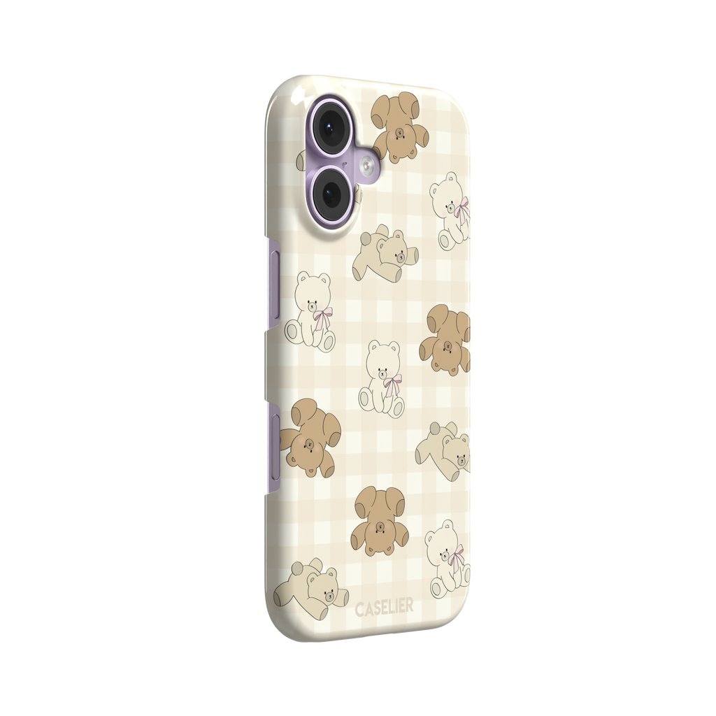 Teddybears phone case in warm cream with illustrated beige and ivory teddy bears scattered over a gingham grid pattern, some bears wearing soft pink bows — snap case, left view