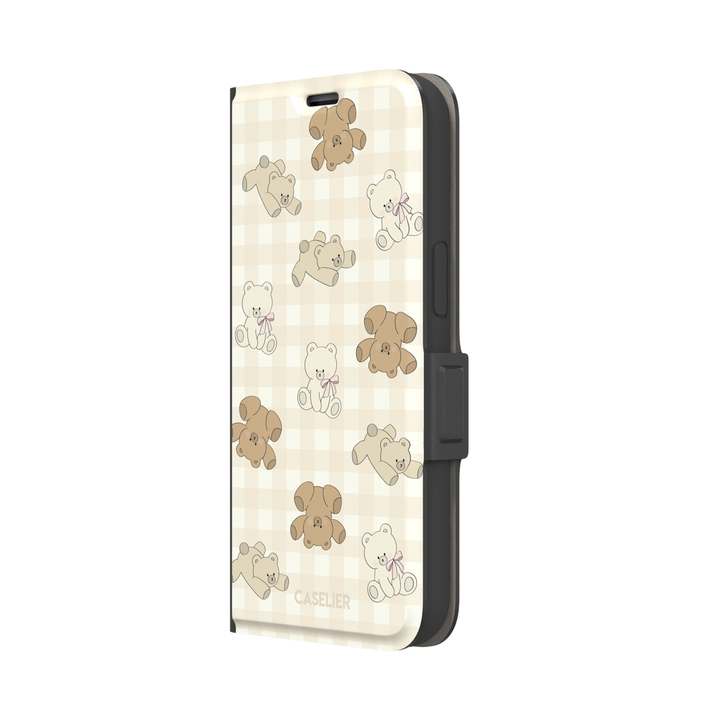 Teddybears phone case in warm cream with illustrated beige and ivory teddy bears scattered over a gingham grid pattern, some bears wearing soft pink bows — wallet case, right view