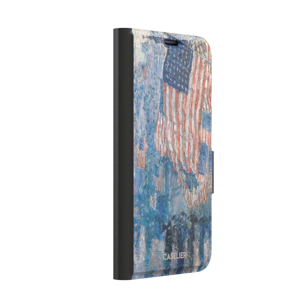 The Avenue in the Rain by Childe Hassam phone case showing impressionist American flags in red, white and blue over a rainy New York street scene, phone case by Caselier — wallet case, left view