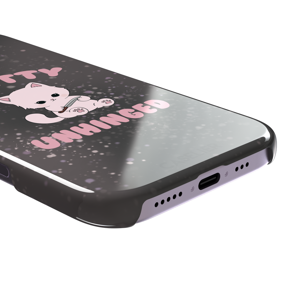 Dark charcoal phone case featuring a pink kawaii kitten holding a knife with 'Pretty Unhinged' text in pink bubble font on a speckled background, phone case by Caselier — snap case, charging port detail