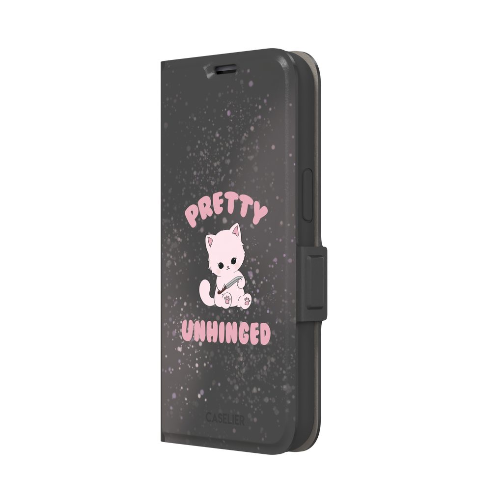 Dark charcoal phone case featuring a pink kawaii kitten holding a knife with 'Pretty Unhinged' text in pink bubble font on a speckled background, phone case by Caselier — wallet case, right view