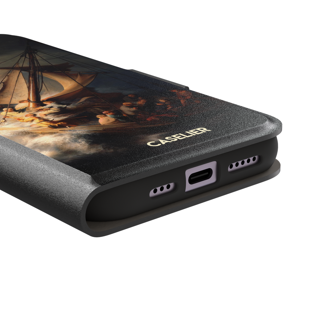 The Storm on the Sea of Galilee by Rembrandt, dark tempestuous ocean, golden-lit figures on a tilting sailboat with billowing sails and dramatic chiaroscuro — wallet case, charging port detail