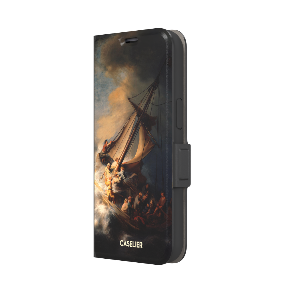 The Storm on the Sea of Galilee by Rembrandt, dark tempestuous ocean, golden-lit figures on a tilting sailboat with billowing sails and dramatic chiaroscuro — wallet case, right view