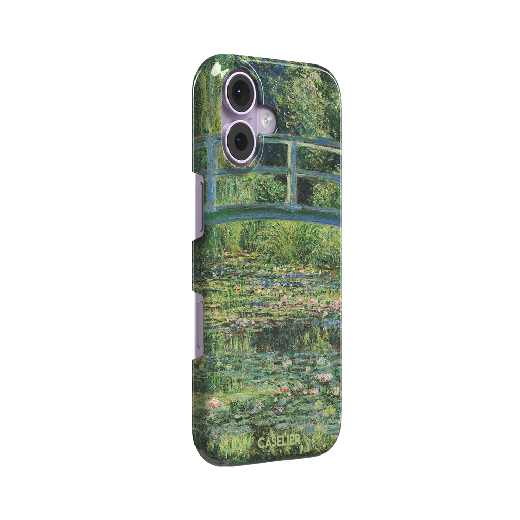 The Water Lily Pond by Claude Monet phone case showing the Japanese bridge over a green lily-covered pond with soft impressionist brushwork in deep greens and pink water lilies, phone case by Caselier — snap case, left view