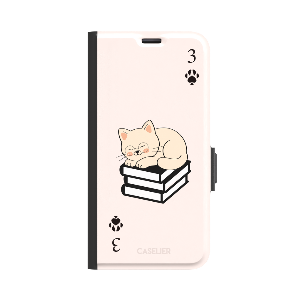 Three of Spades phone case in blush pink with a sleepy illustrated cat resting on stacked books and paw print spade symbols at each corner, by Caselier — wallet case, front view