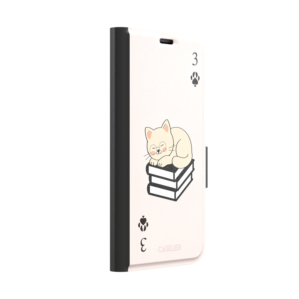 Three of Spades phone case in blush pink with a sleepy illustrated cat resting on stacked books and paw print spade symbols at each corner, by Caselier — wallet case, left view