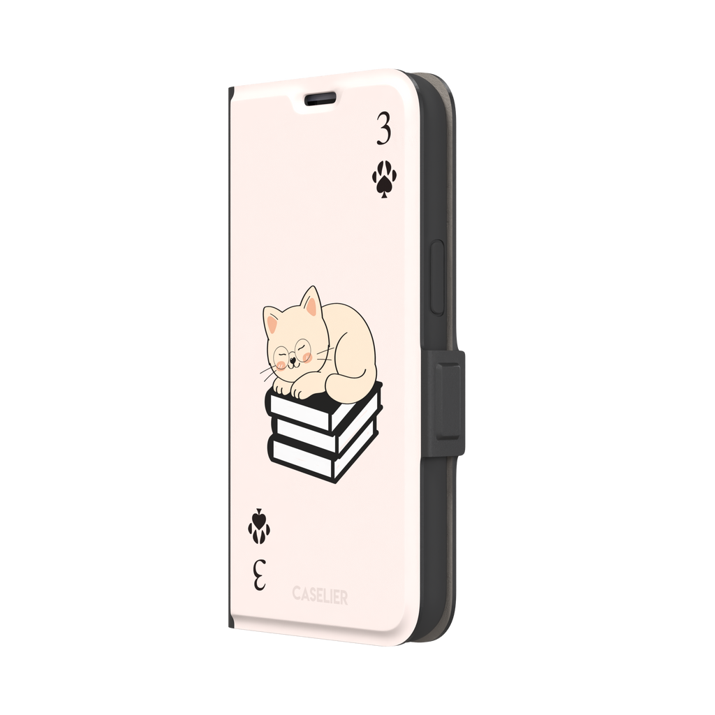 Three of Spades phone case in blush pink with a sleepy illustrated cat resting on stacked books and paw print spade symbols at each corner, by Caselier — wallet case, right view