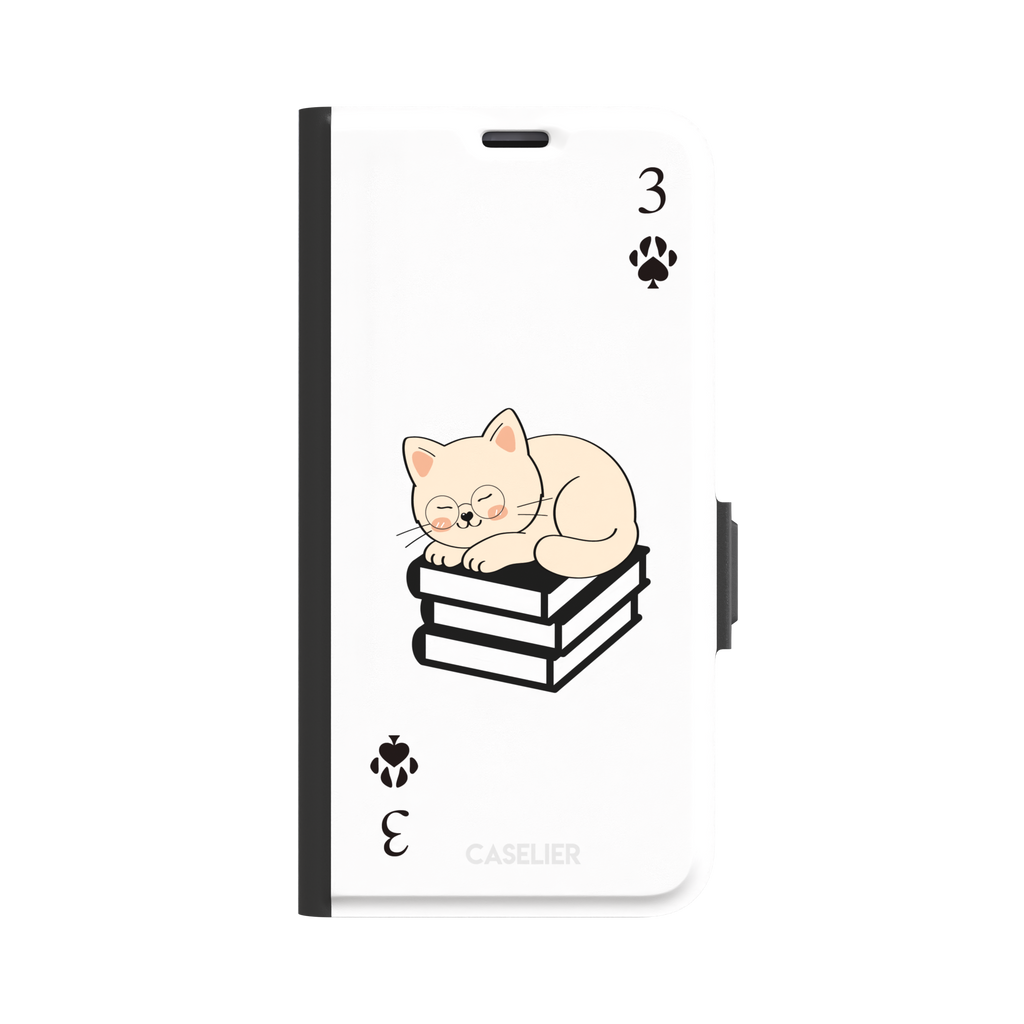 Three of Spades phone case in white with a sleepy illustrated cat resting on stacked books and paw print spade symbols at each corner, by Caselier — wallet case, front view
