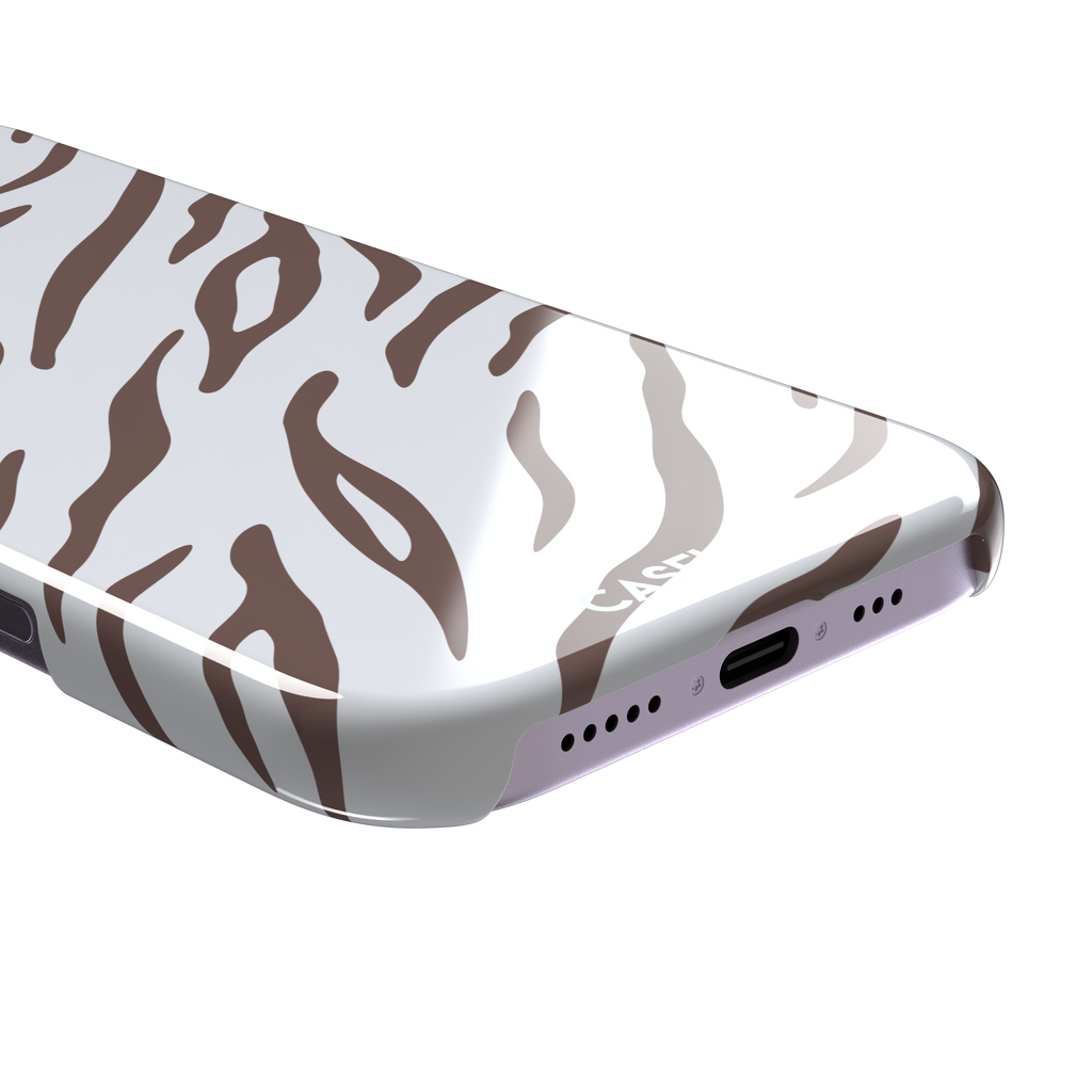 Tiger print phone case in white with mocha brown stripes, minimal light-toned animal print variant, phone case by Caselier — snap case, charging port detail