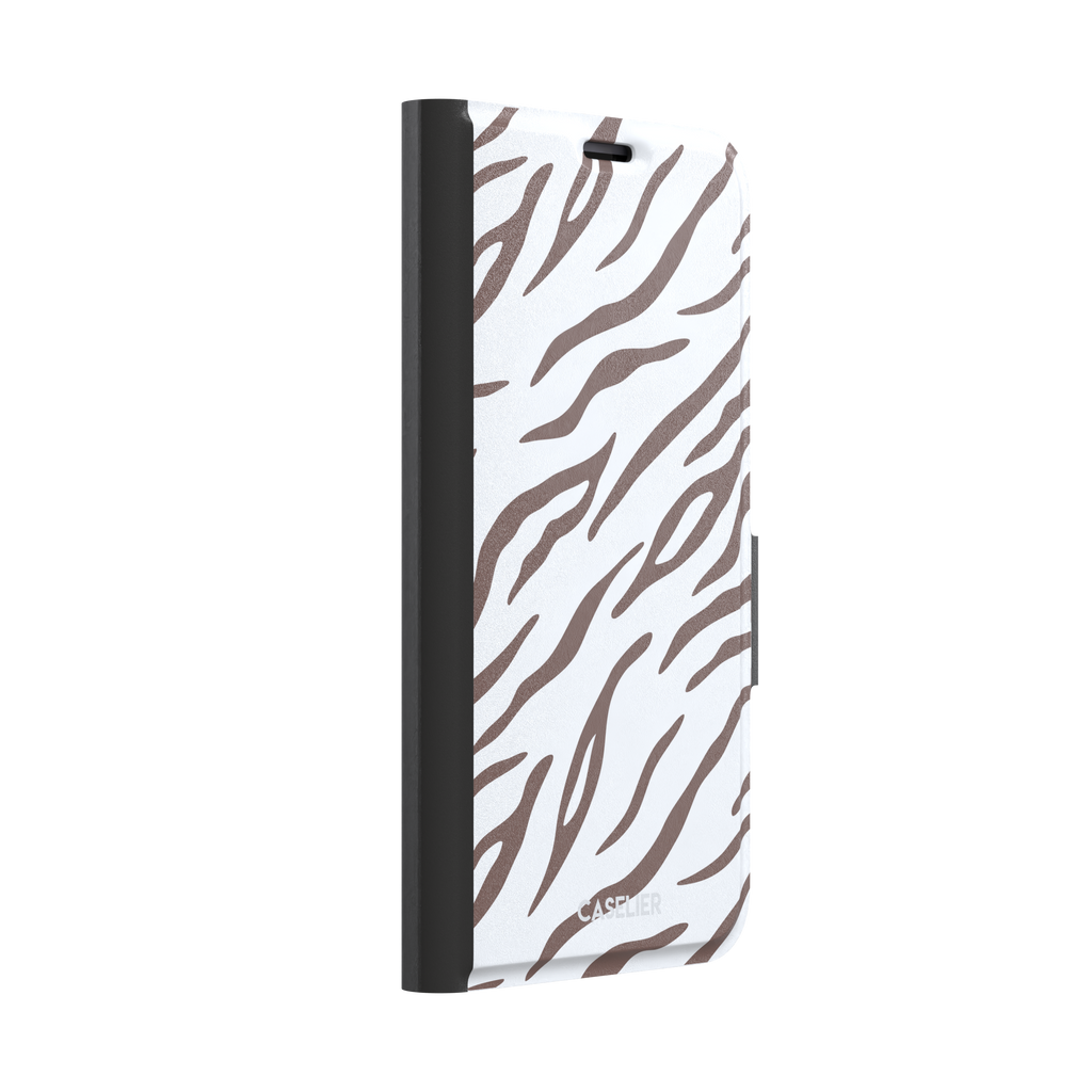 Tiger print phone case in white with mocha brown stripes, minimal light-toned animal print variant, phone case by Caselier — wallet case, left view