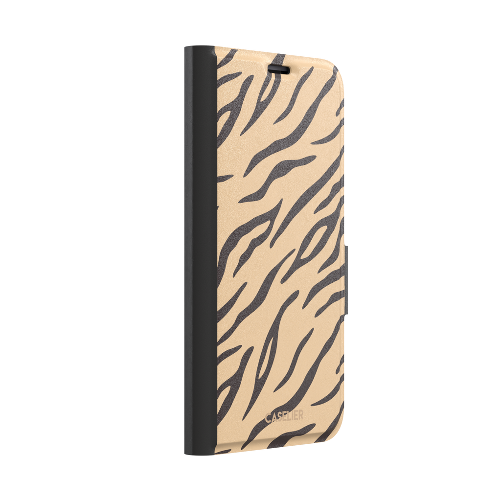 Tiger print phone case in sandy beige with dark brown stripes, warm-toned animal print variant, phone case by Caselier — wallet case, left view