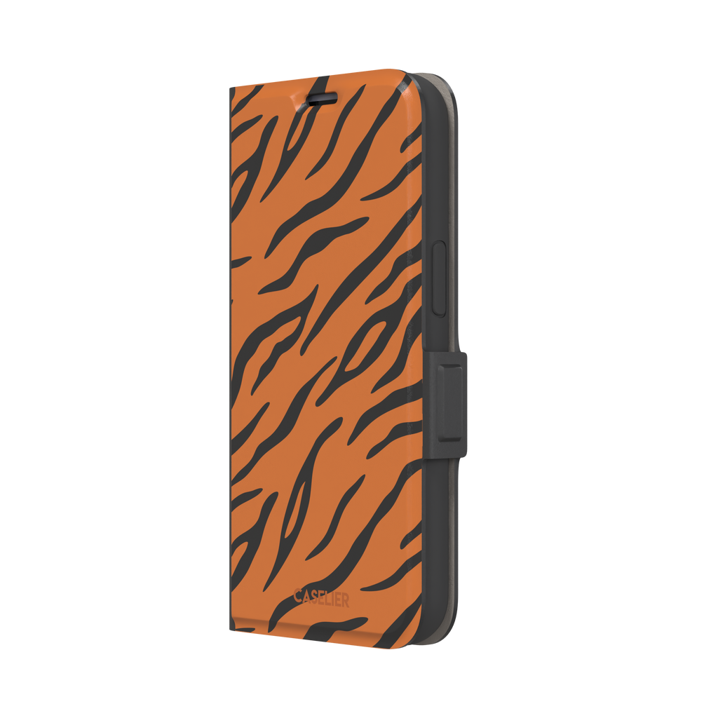 Tiger print phone case in orange with bold black stripes, full-bleed animal print design, phone case by Caselier — wallet case, right view