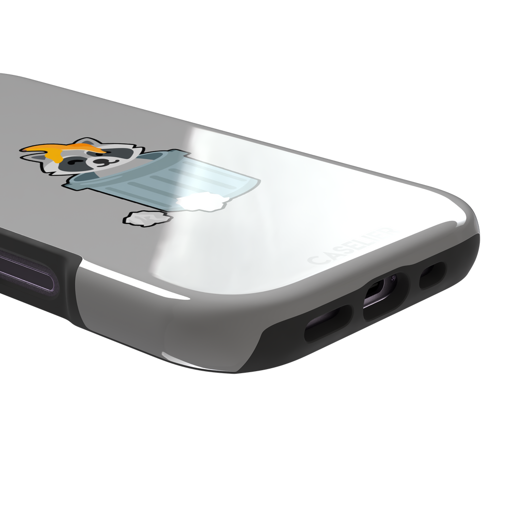 Grey phone case featuring a cute cartoon raccoon sitting inside a metal trash can with an orange food scrap on its head and crumpled paper on the ground, phone case by Caselier — tough case, charging port detail