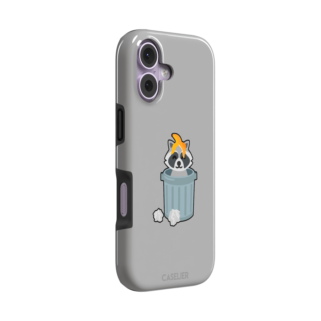 Grey phone case featuring a cute cartoon raccoon sitting inside a metal trash can with an orange food scrap on its head and crumpled paper on the ground, phone case by Caselier — tough case, left view