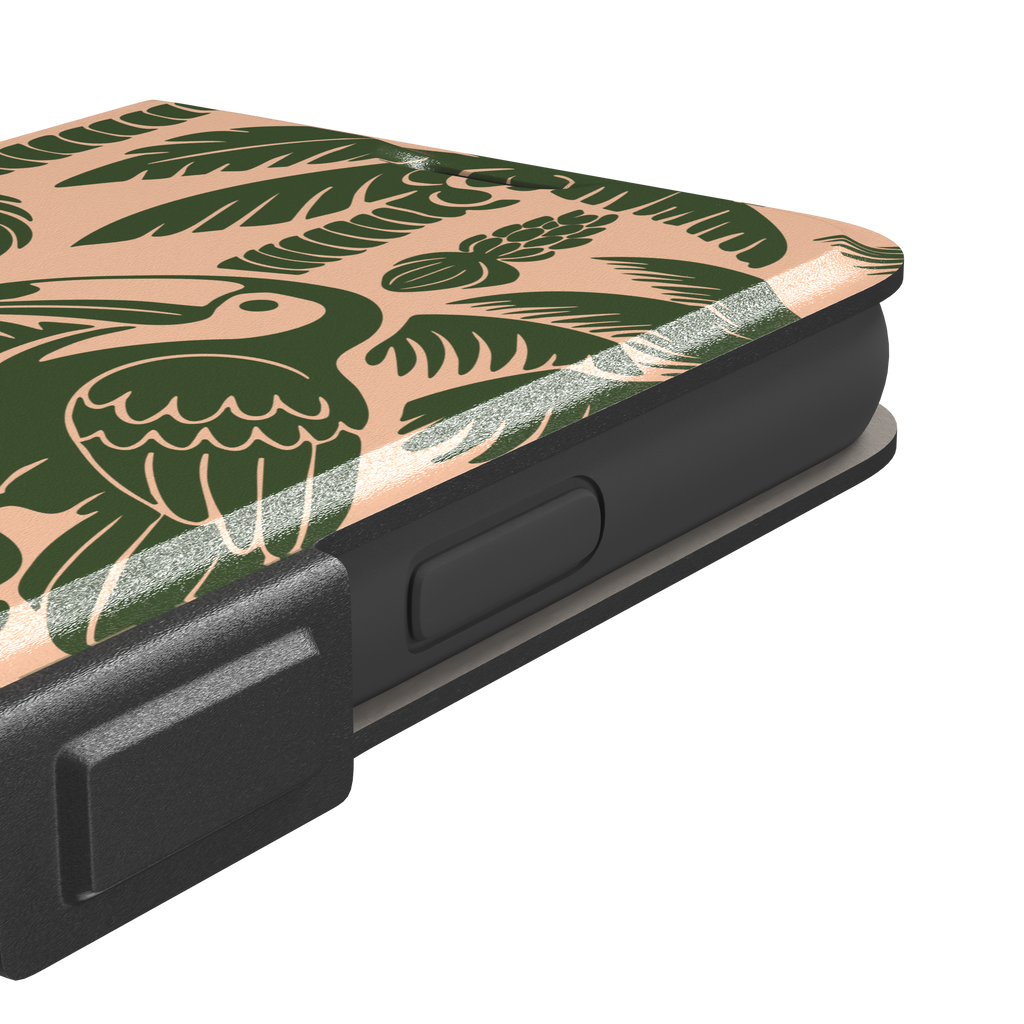 Tropical phone case in peach and dark green two-tone colorway featuring the jungle illustration with leopard, toucan, crocodile, monstera leaves, and hibiscus — wallet case, volume buttons detail