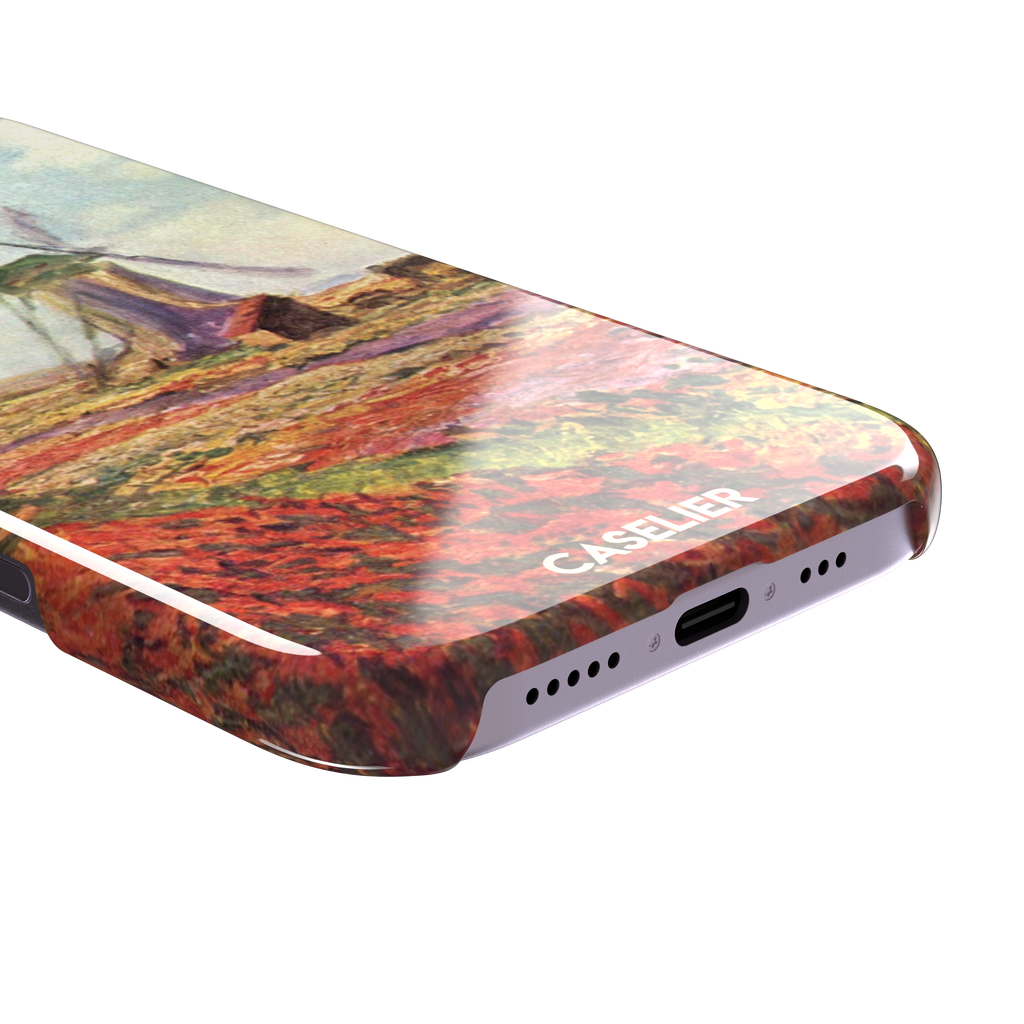 Tulip Fields in Holland by Claude Monet phone case featuring red and purple flower fields with a Dutch windmill under a cloudy sky in impressionist style, phone case by Caselier — snap case, charging port detail