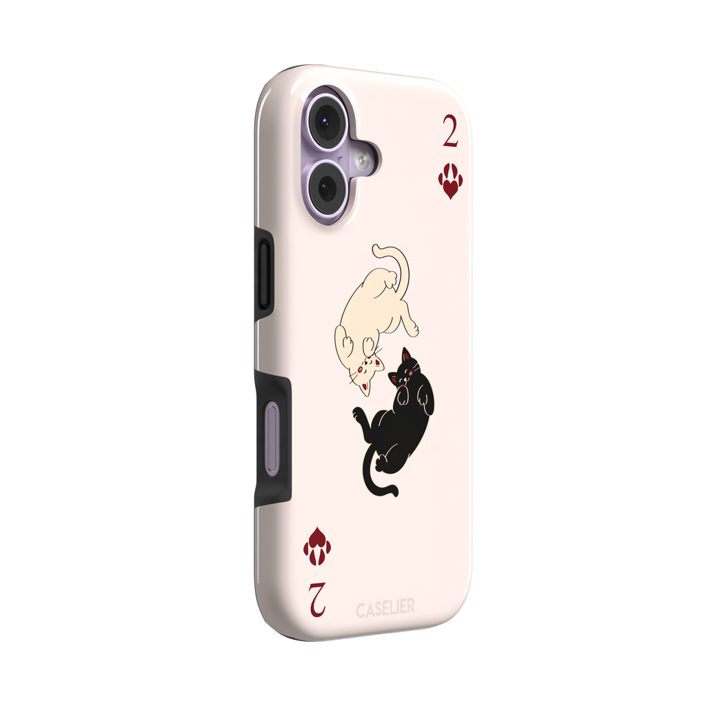 Two of Hearts phone case in blush pink with a cream and black cat playing card design and crimson paw suit symbols, phone case by Caselier — tough case, left view