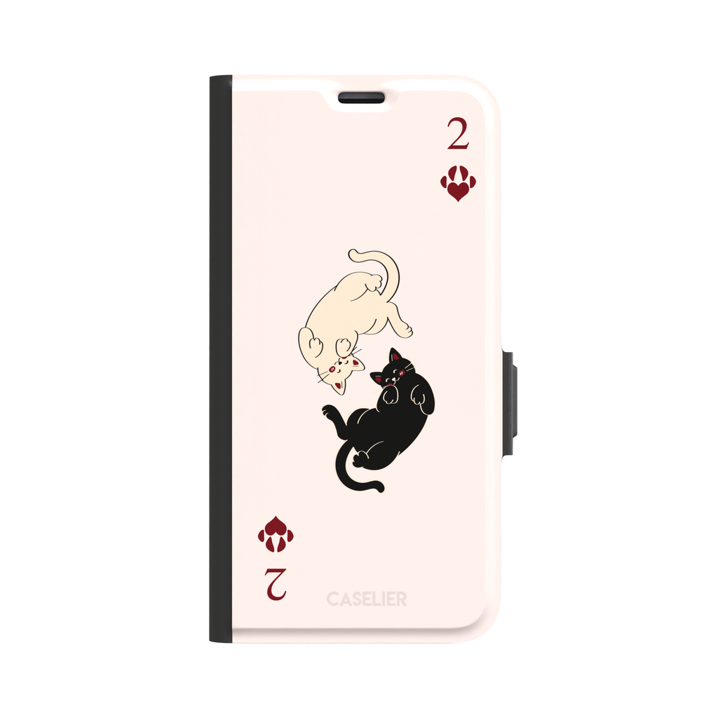 Two of Hearts phone case in blush pink with a cream and black cat playing card design and crimson paw suit symbols, phone case by Caselier — wallet case, front view