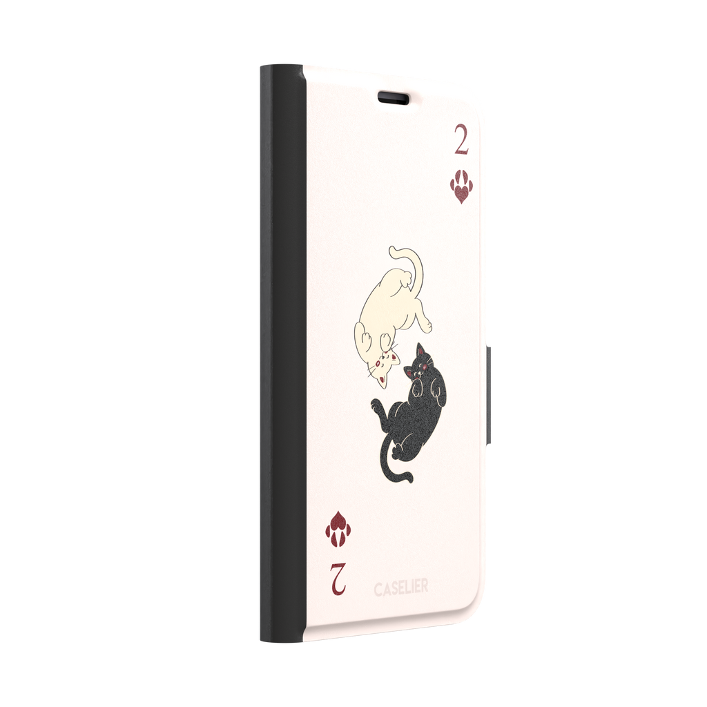 Two of Hearts phone case in blush pink with a cream and black cat playing card design and crimson paw suit symbols, phone case by Caselier — wallet case, left view