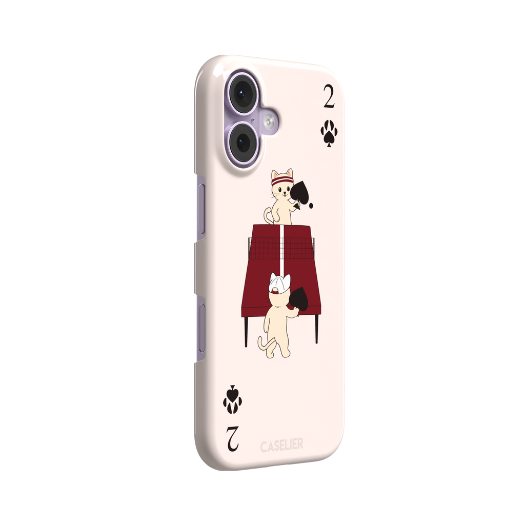 Two of Spades phone case in blush pink from the Paw Decks collection, showing two cartoon cats playing ping pong with spade paddles across a red table, with paw print card markings, phone case by Caselier — snap case, left view
