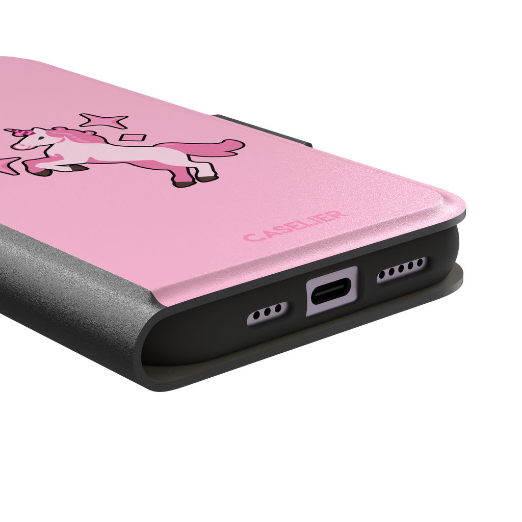 Pink kawaii unicorn rearing up with sparkle stars on a bubblegum-pink phone case by Caselier — wallet case, charging port detail