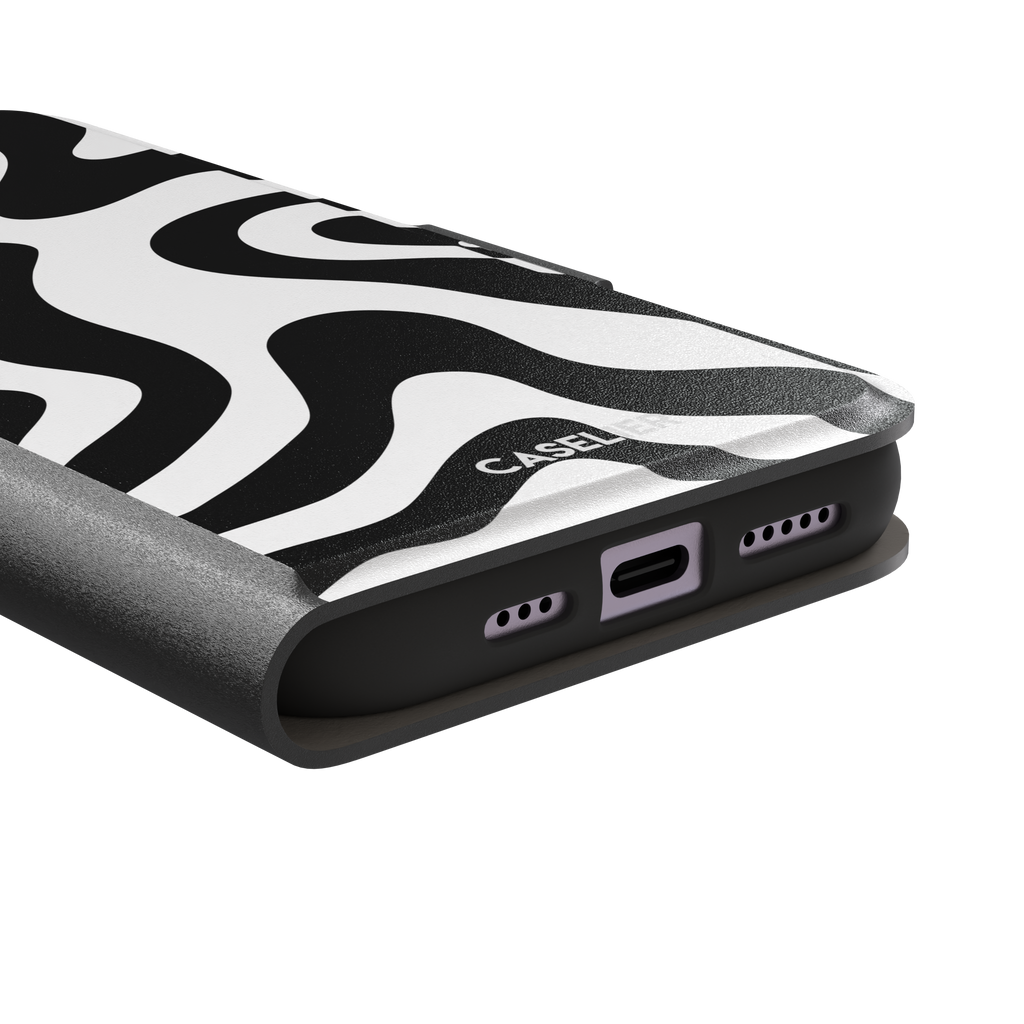 Wavey abstract phone case in black and white fluid swirl pattern, phone case by Caselier — wallet case, charging port detail